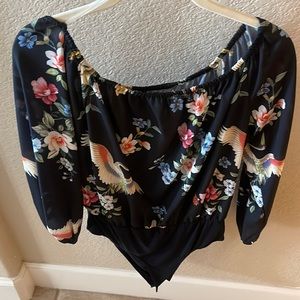 Black, flowered body suit with elastic scoop neck too